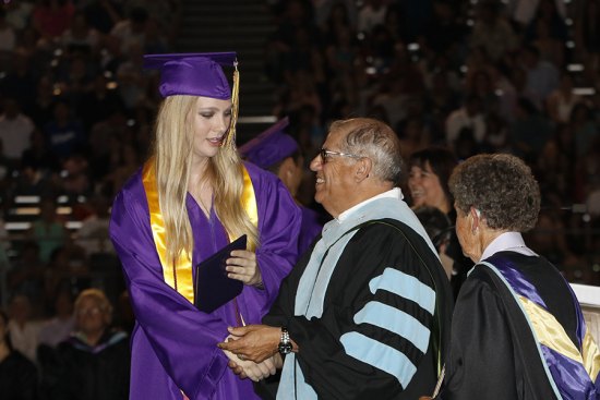 Lemoore School Boardmember Lupe Solis at recent Lemoore graduation ceremony.